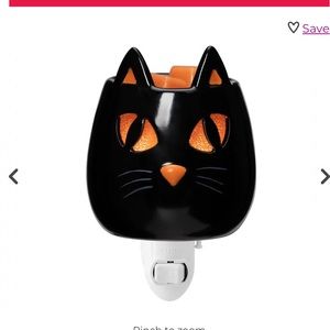 Mini Scentsy spooky stare warmer.